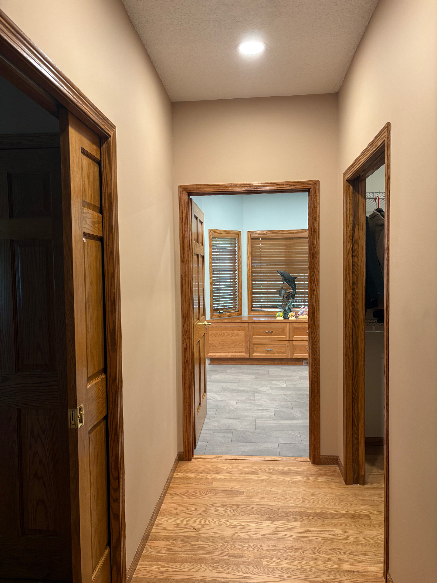 Oak Marsh hallway leading into the accessible primary suite
