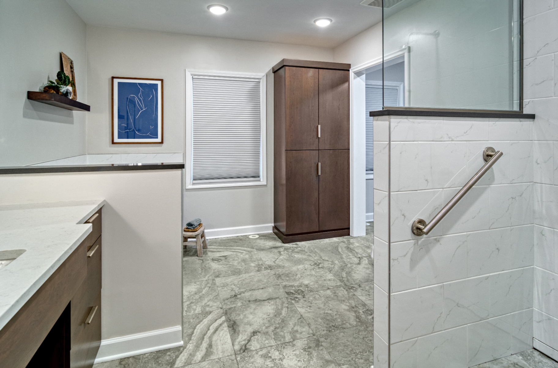 Accessible primary bath with roll in shower and grab bar