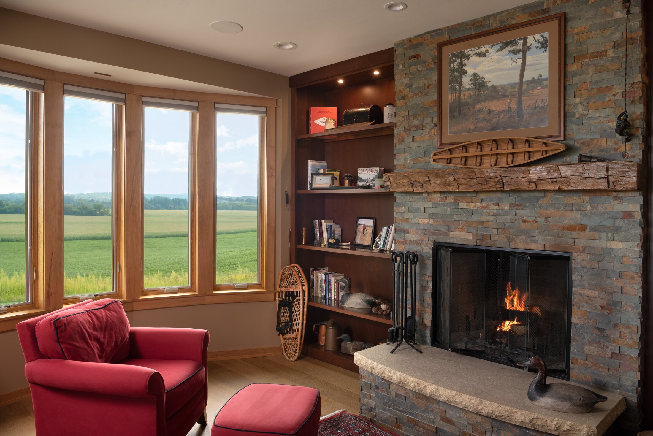 Vista Ridge den with warm millwork